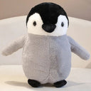 Kuscheltiere Pinguine und Walross
