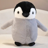 Kuscheltiere Pinguine und Walross