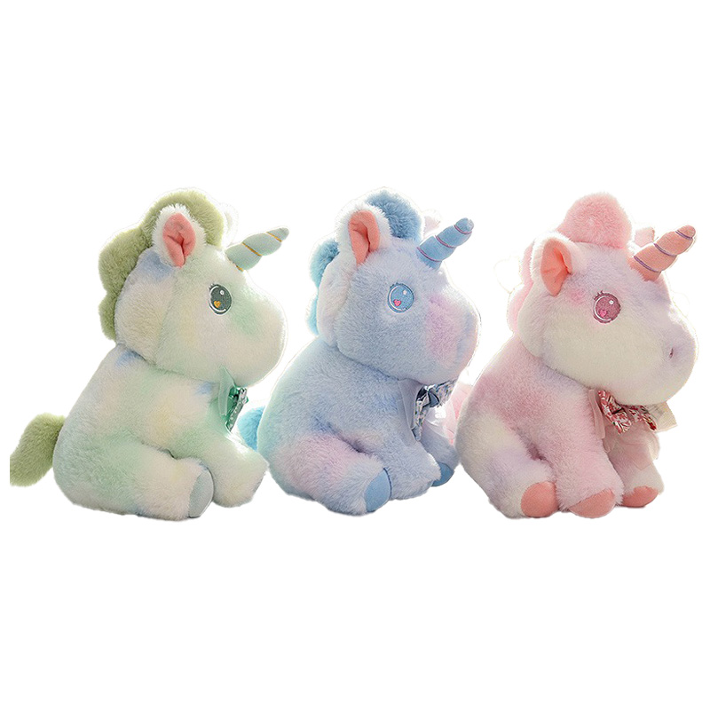 Plüschtier pastellfarben Einhorn sitzend 26 cm