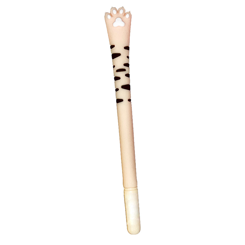 Stift in Katzenpfotenform. Der Stift ist beige und hat ein Leopardenmuster in schwarz.