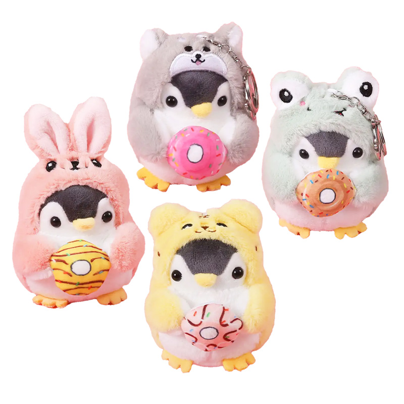4 Plüschpinguine, die jeweils unterschiedliche andere Tierkostüme tragen und Donuts in den Händen halten. Es gibt einen Hasen, einen Hund, einen Frosch und einen Bären.
