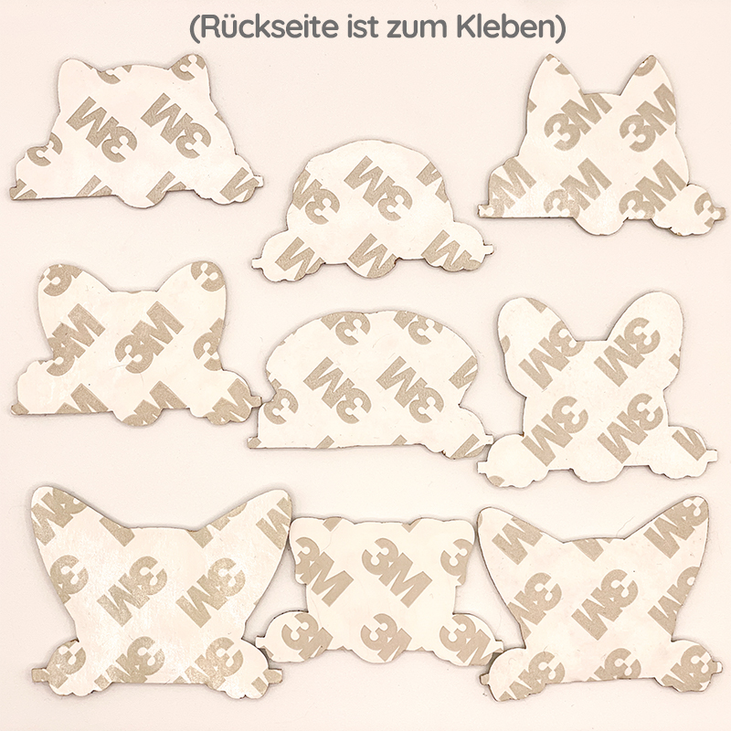 Die Rückseiten von Hunde-Patches zeigt, dass man sie auch kleben kann.